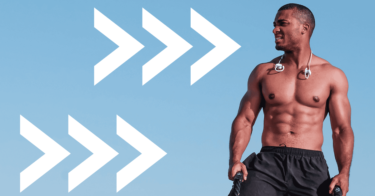 An athletic man standing up without a shirt. Lose 30 pounds in 30 days.