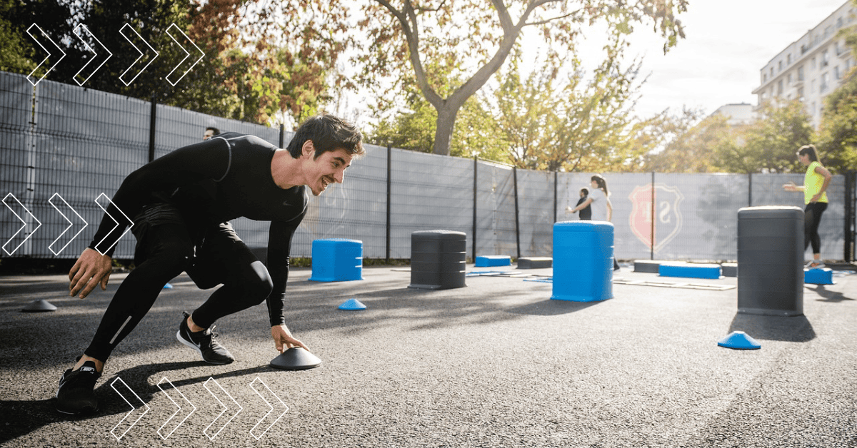 A man with a black sport suite on working-out outside. How to lose 30 pounds in 30 days. 